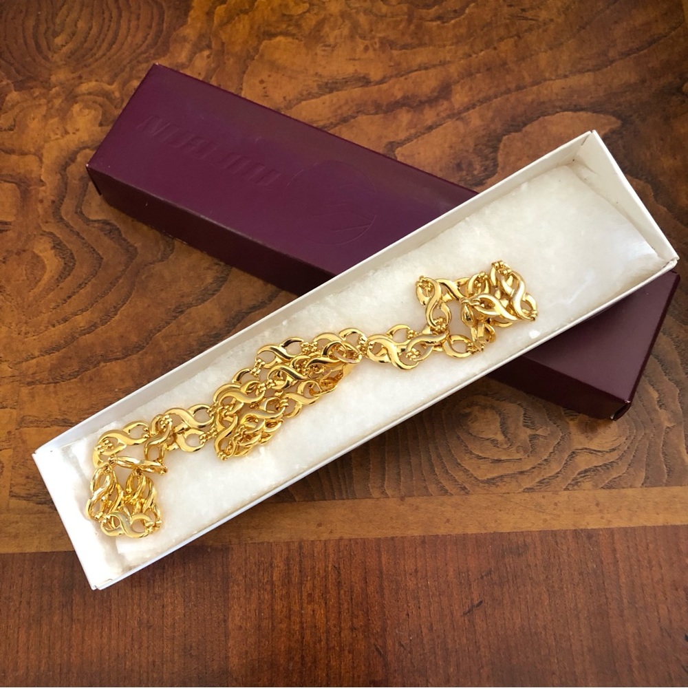 Vintage 80s shiny gold infinity link necklace and bracelet set NIB